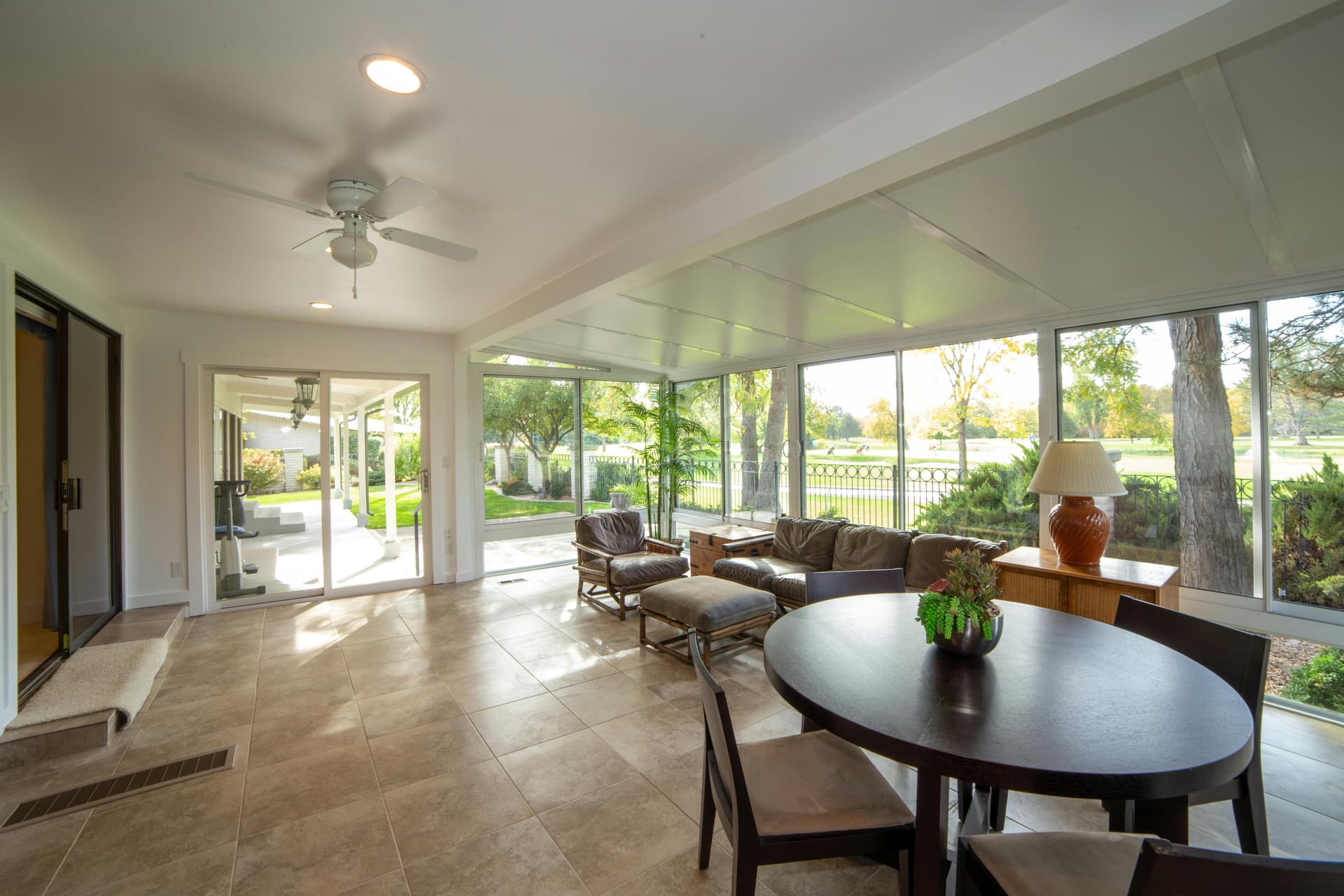 Sunroom Conversion Ideas Featuring Bi-Fold and Tempered Glass Options